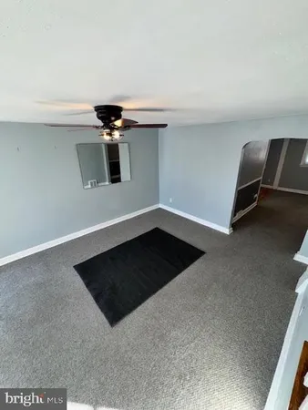 a view of a livingroom with a flat screen tv