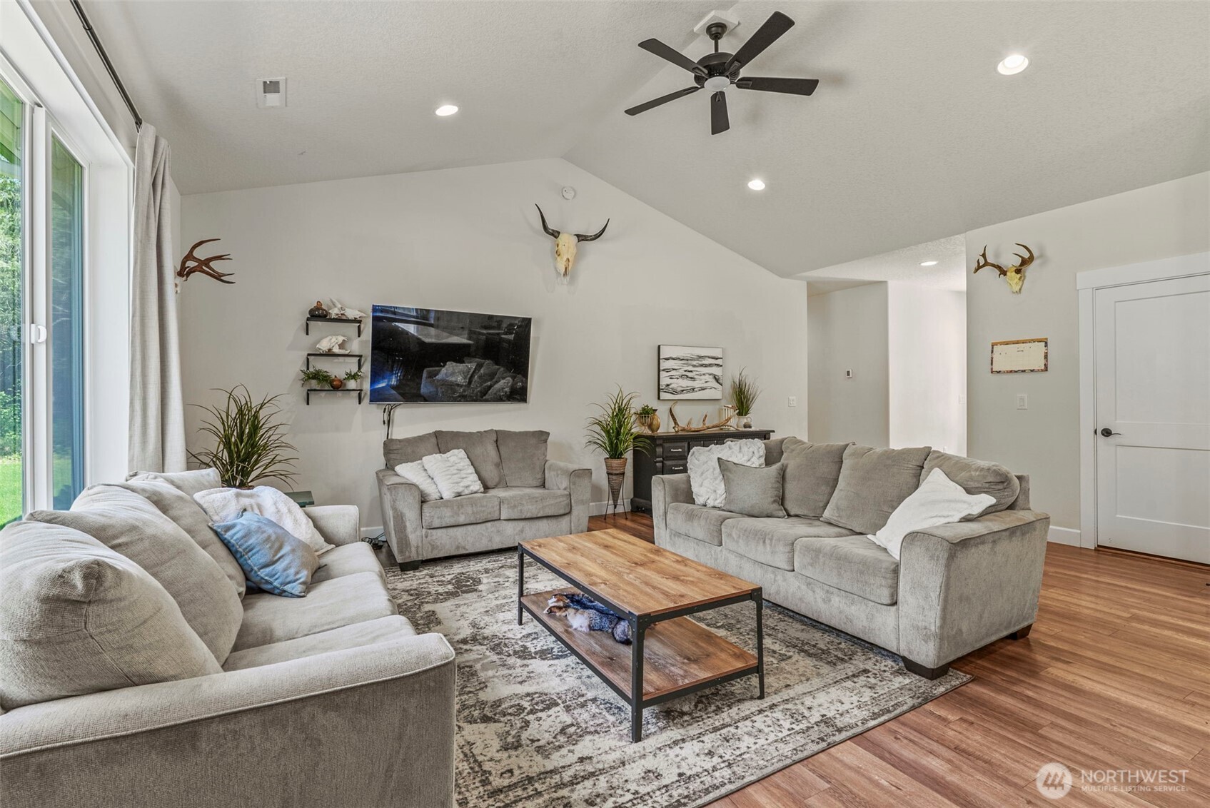 266 Fir Road Ariel, WA 98603 - Photo 11 of 32 a living room with furniture and a flat screen tv
