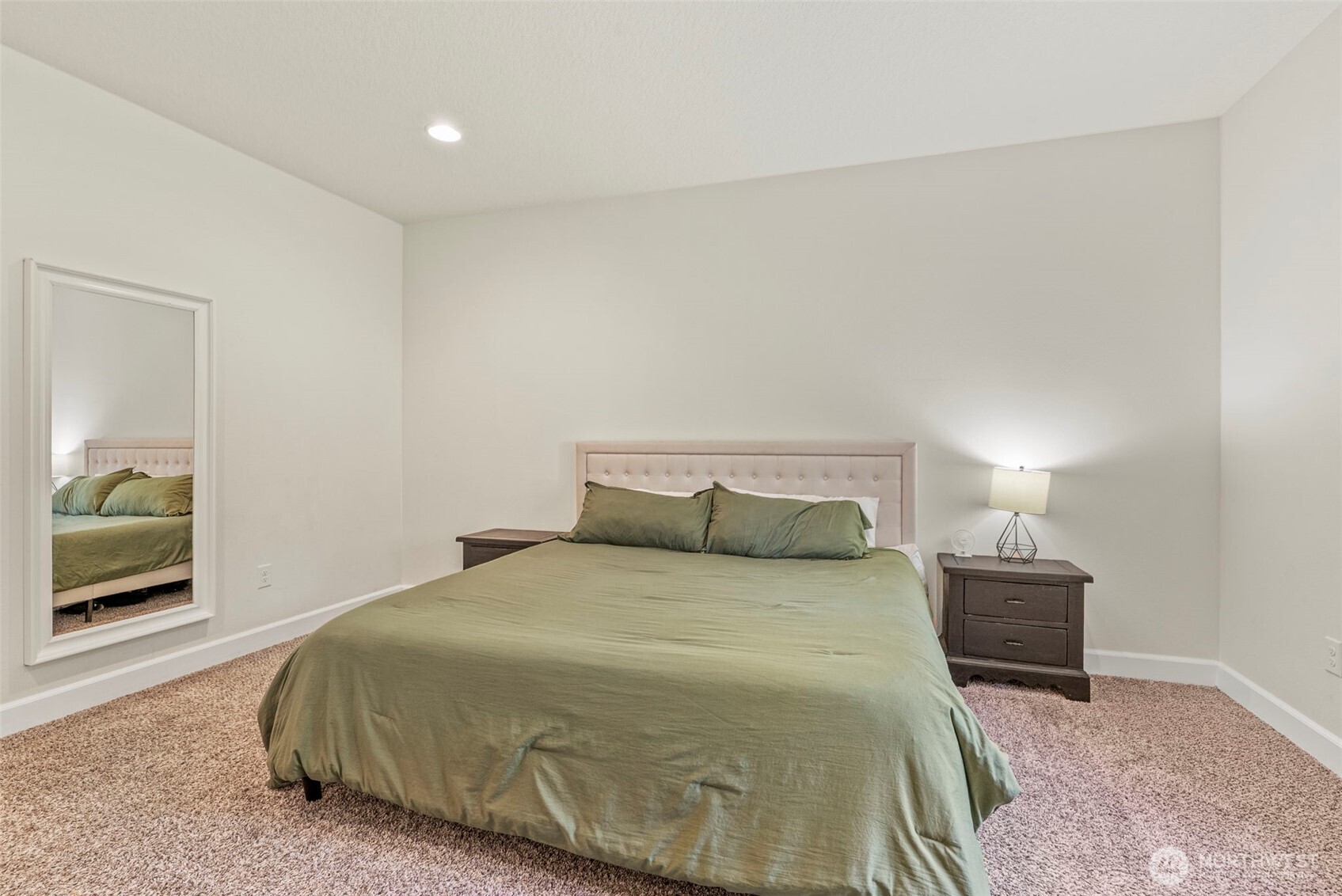 266 Fir Road Ariel, WA 98603 - Photo 13 of 32 a bedroom with a bed and a lamp