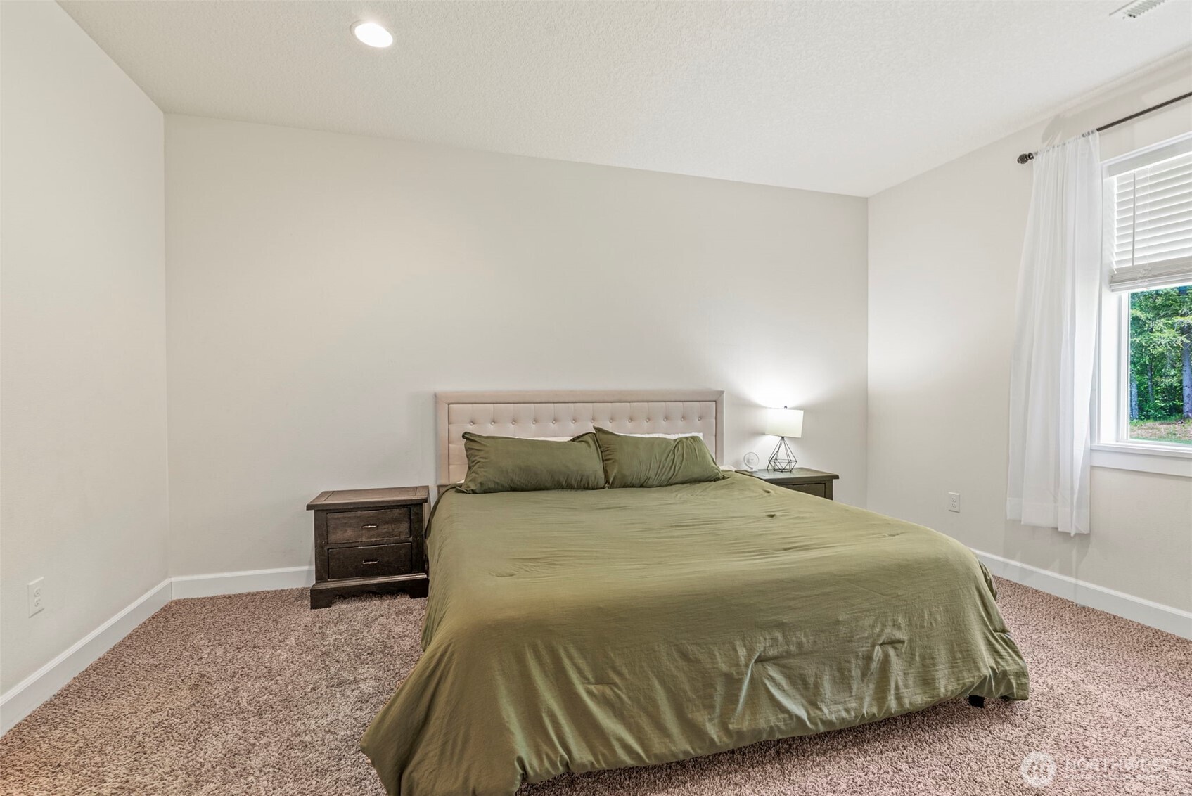 266 Fir Road Ariel, WA 98603 - Photo 14 of 32 a bedroom with a bed and a window