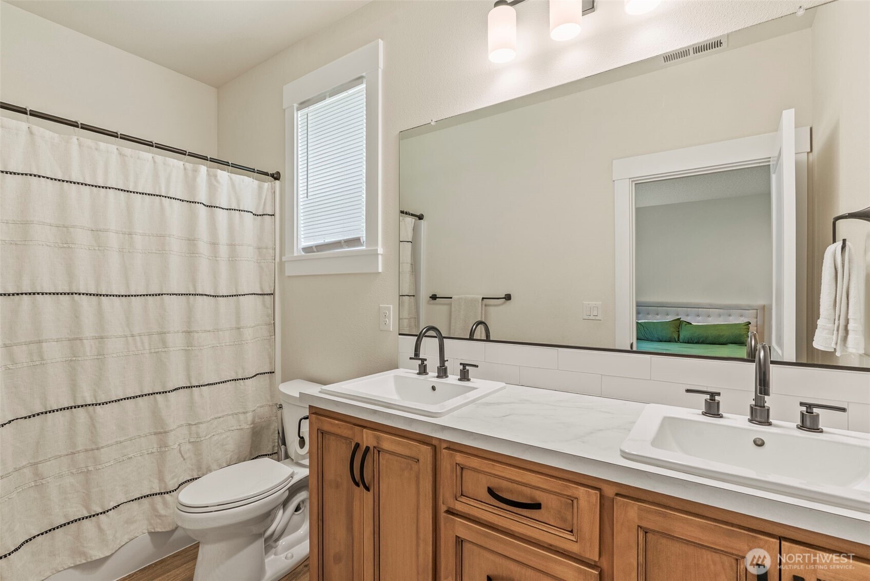 266 Fir Road Ariel, WA 98603 - Photo 16 of 32 a bathroom with a sink a toilet and shower