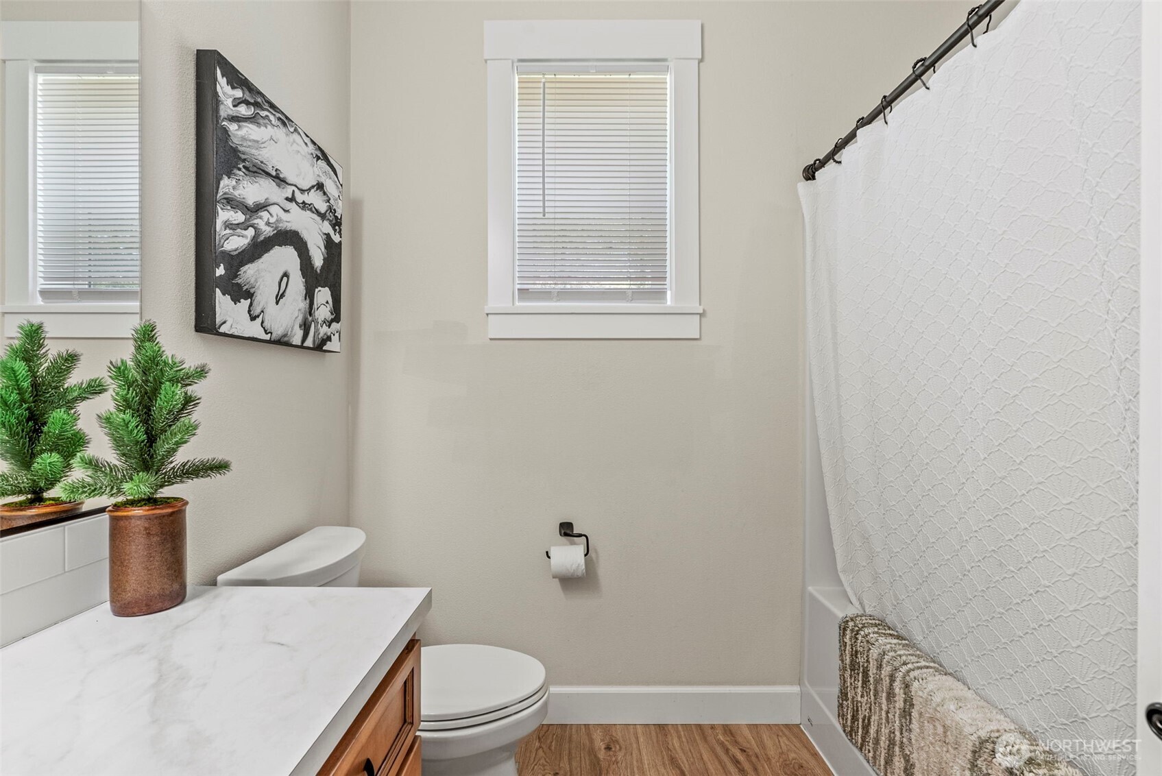266 Fir Road Ariel, WA 98603 - Photo 19 of 32 a bathroom with a toilet a sink and a mirror