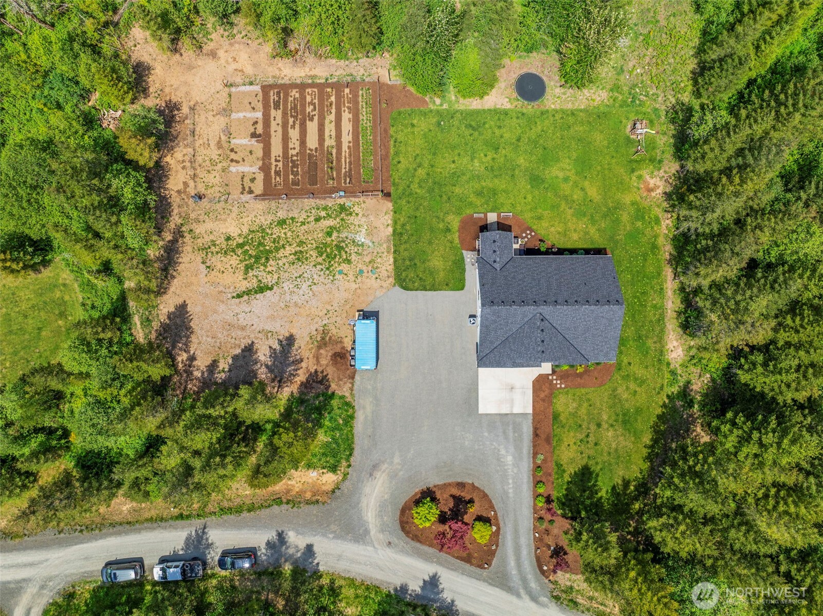 266 Fir Road Ariel, WA 98603 - Photo 31 of 32 an aerial view of a house with a yard
