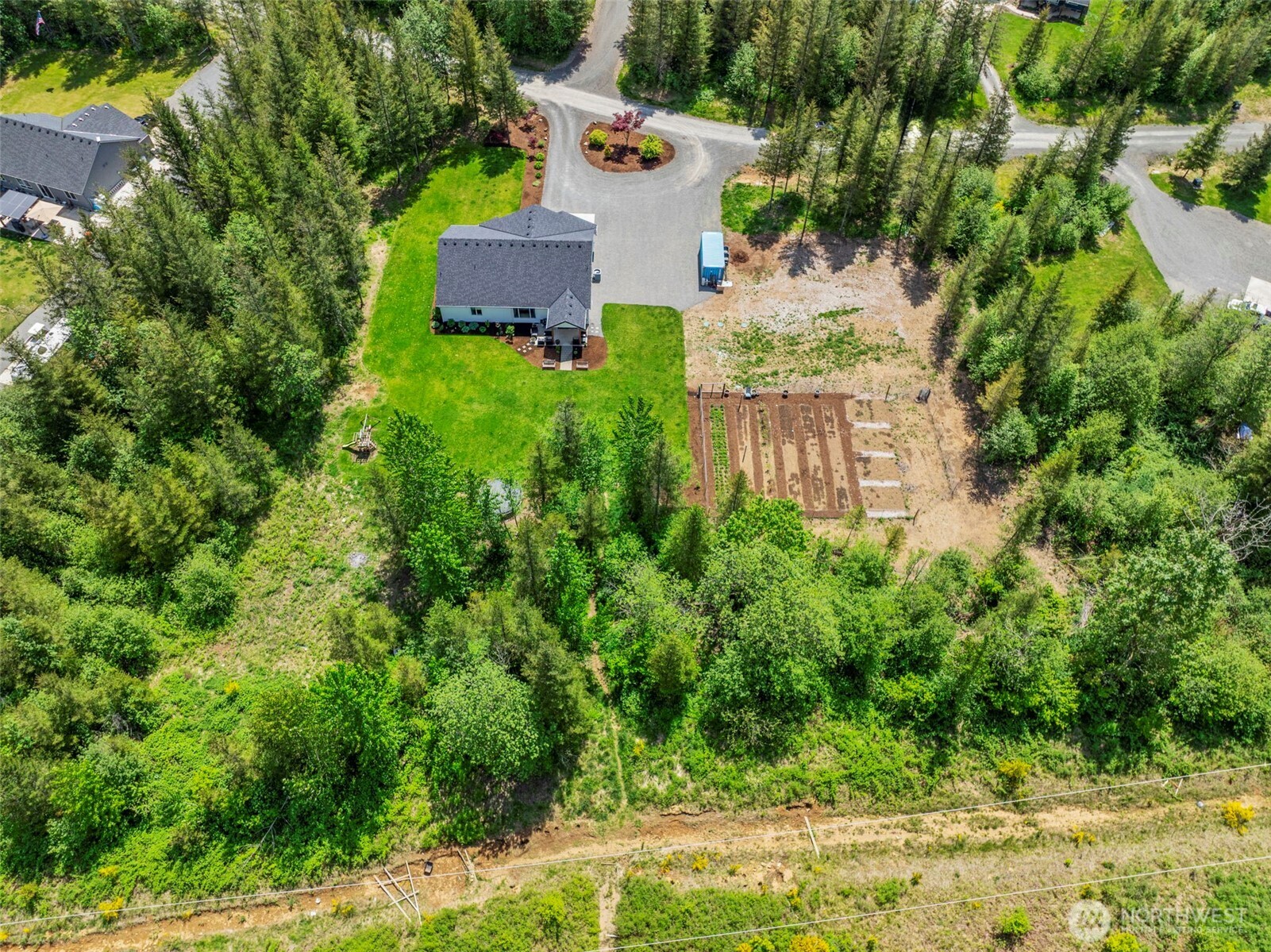 266 Fir Road Ariel, WA 98603 - Photo 32 of 32 an aerial view of residential house with outdoor space