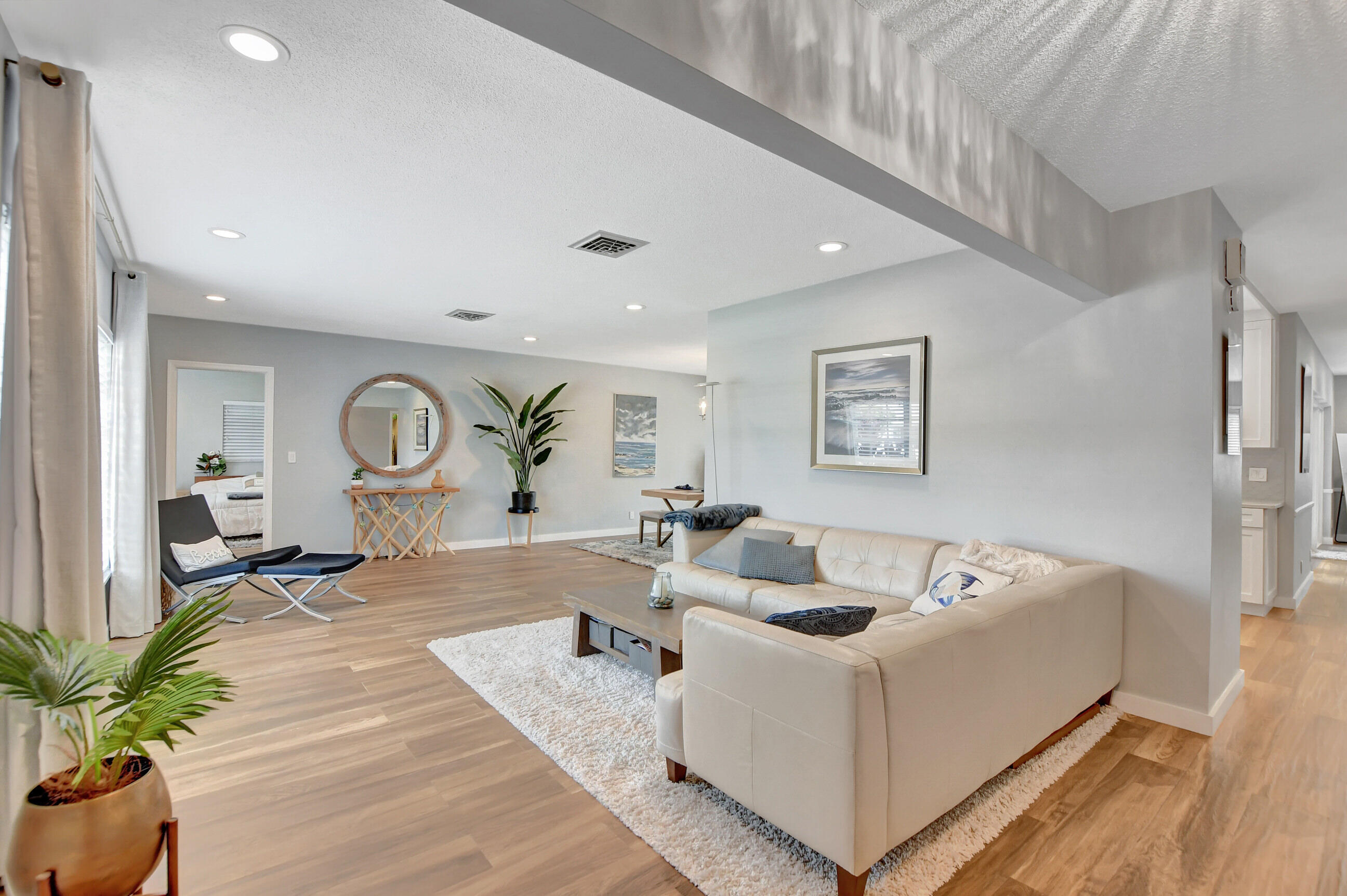 510 Silver Lane Boca Raton, FL 33432 - Photo 1 of 24 a living room with furniture and a large window