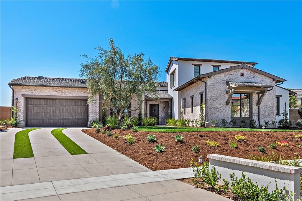 9 Catalina Vista Road Ladera Ranch, CA 92694 - Photo 2 of 41 a front view of a house with garden