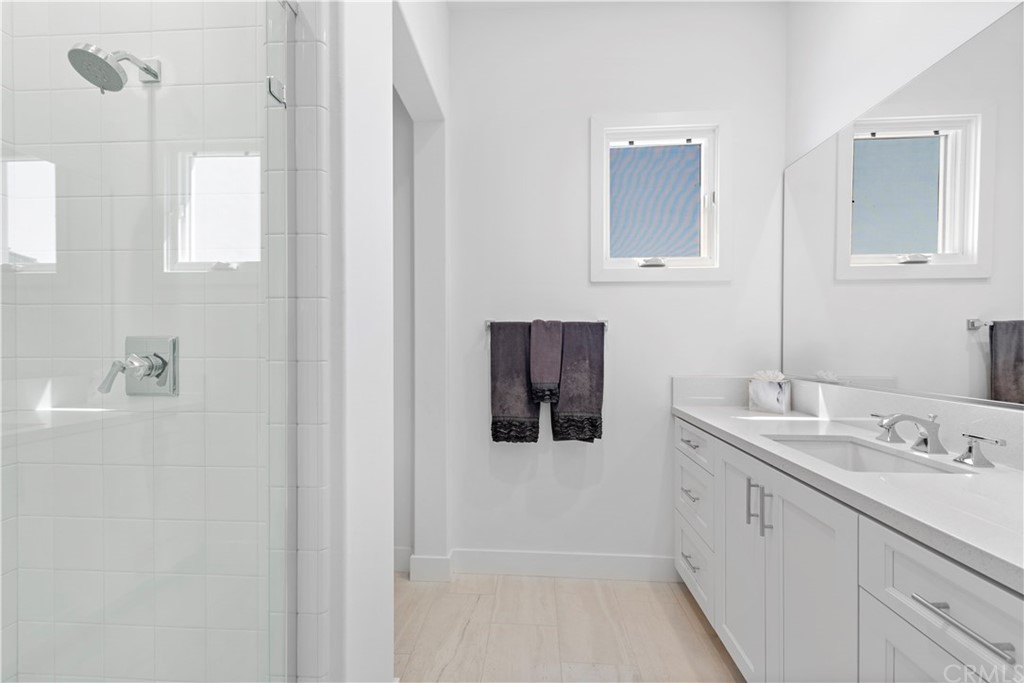 9 Catalina Vista Road Ladera Ranch, CA 92694 - Photo 24 of 41 a bathroom with a sink and mirror