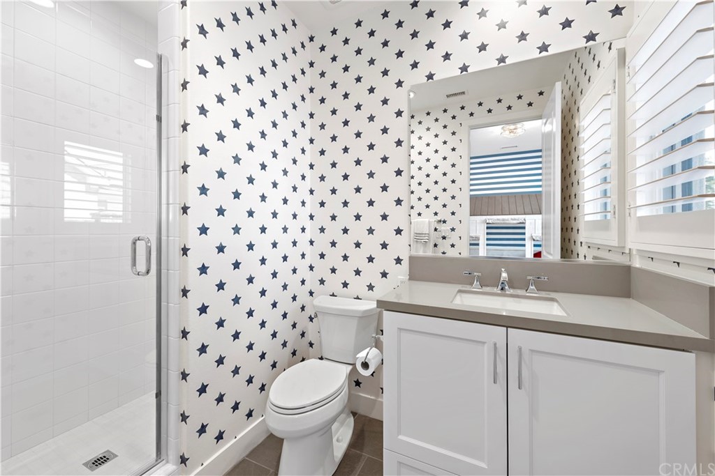 9 Catalina Vista Road Ladera Ranch, CA 92694 - Photo 30 of 41 a bathroom with a sink toilet and shower