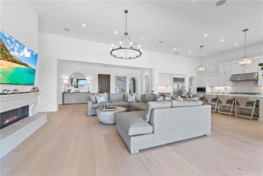 9 Catalina Vista Road Ladera Ranch, CA 92694 - Photo 3 of 41 a living room with fireplace furniture and a flat screen tv