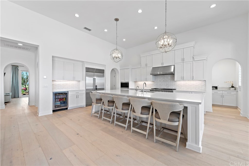 9 Catalina Vista Road Ladera Ranch, CA 92694 - Photo 4 of 41 a large kitchen with a table and chairs