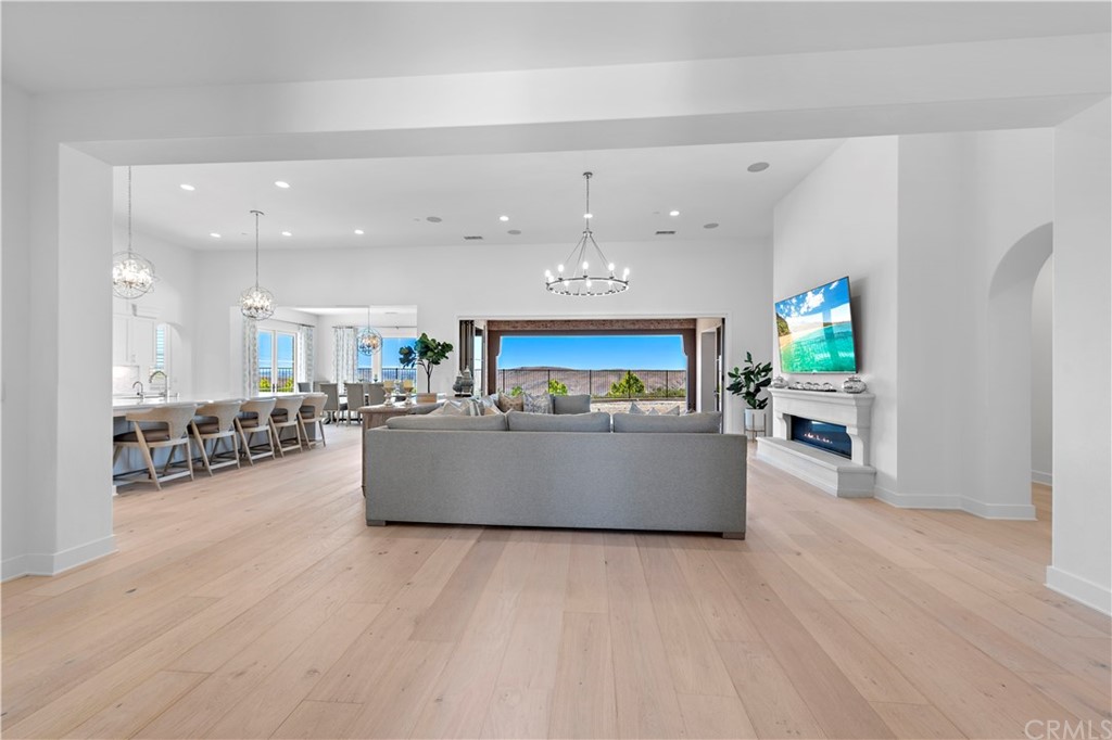 9 Catalina Vista Road Ladera Ranch, CA 92694 - Photo 7 of 41 a living room with furniture and a wooden floor