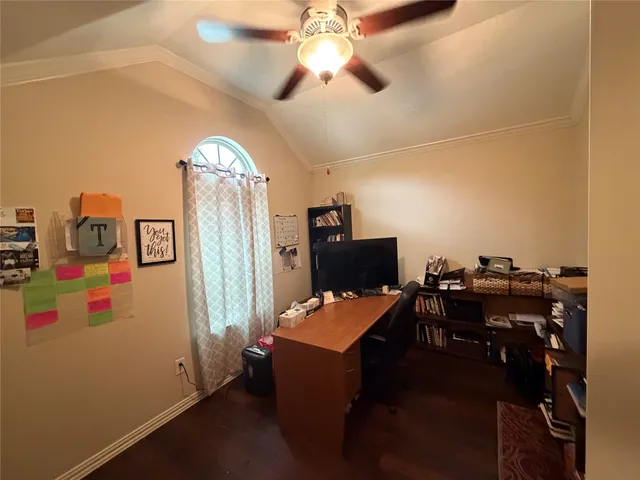 a workspace with furniture and chandelier