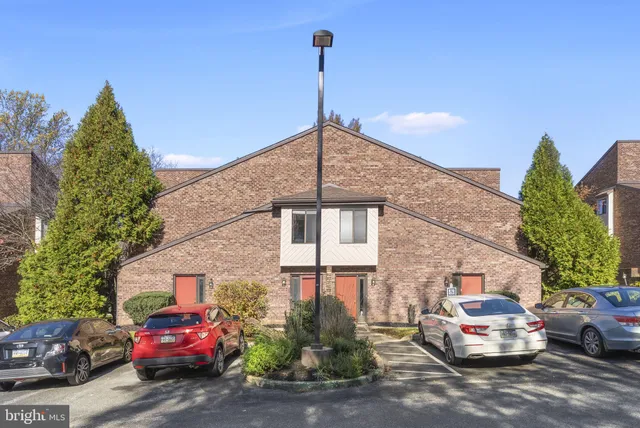 a car parked in front of a house