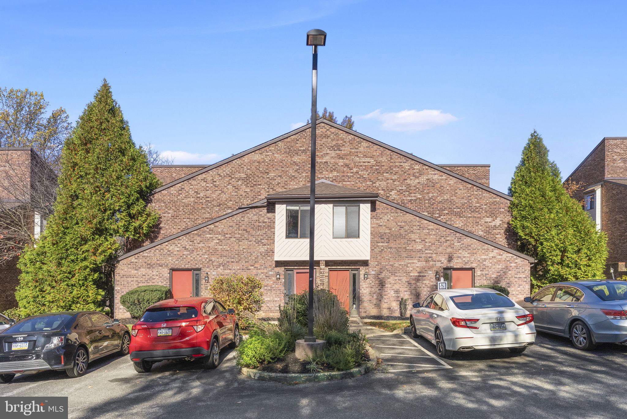a car parked in front of a house