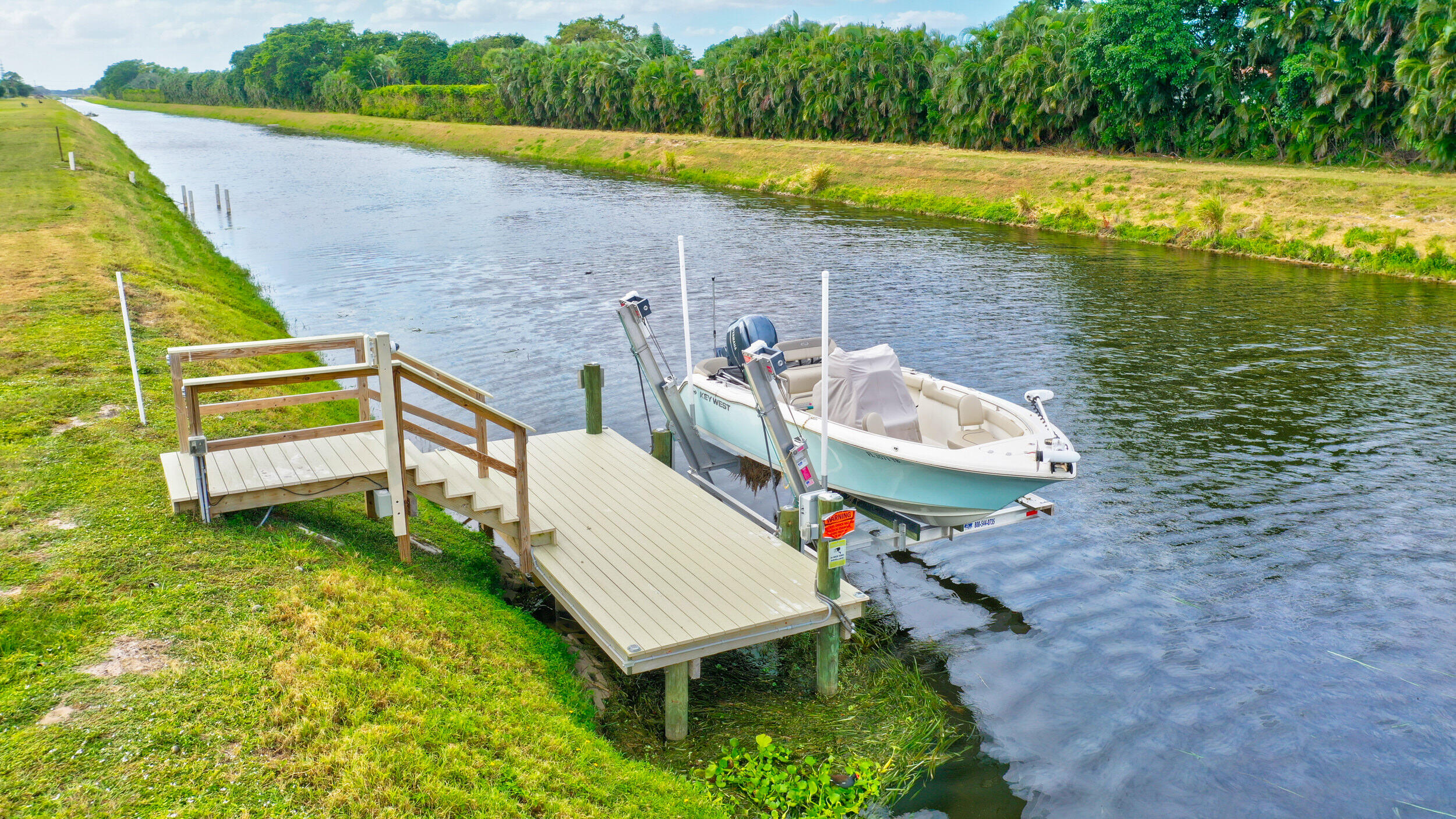 3623 Lone Pine Road Delray Beach, FL 33445 - Photo 80 of 95 Boat Dock w/Lift