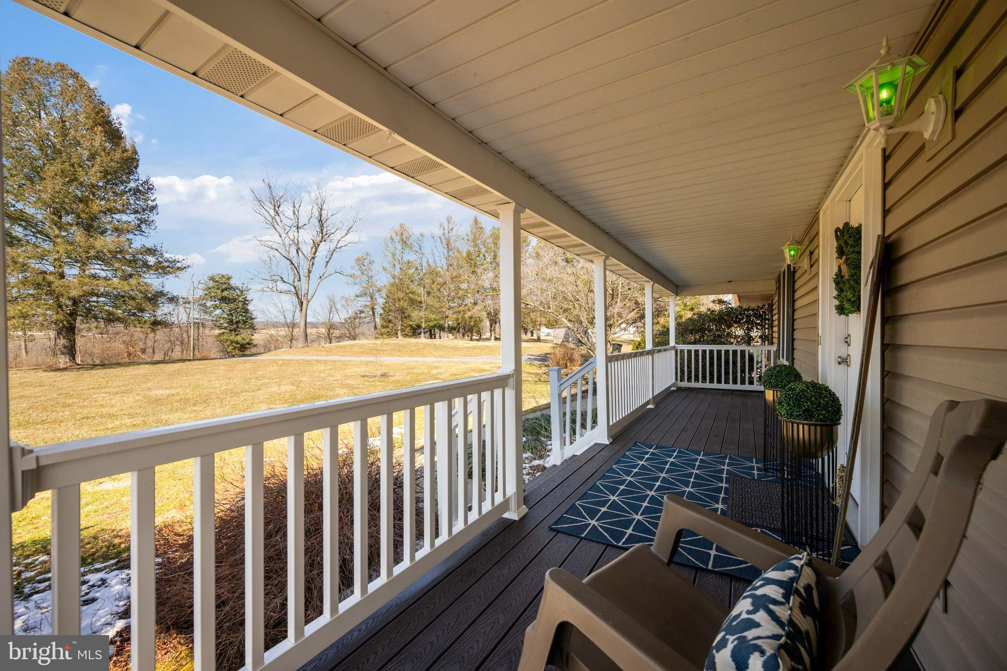 1485 Bachmans Valley Road Westminster, MD 21158 - Photo 45 of 91 Serene porch with scenic countryside views.