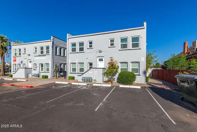 a front view of a building with street view