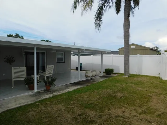 a house view with a garden space