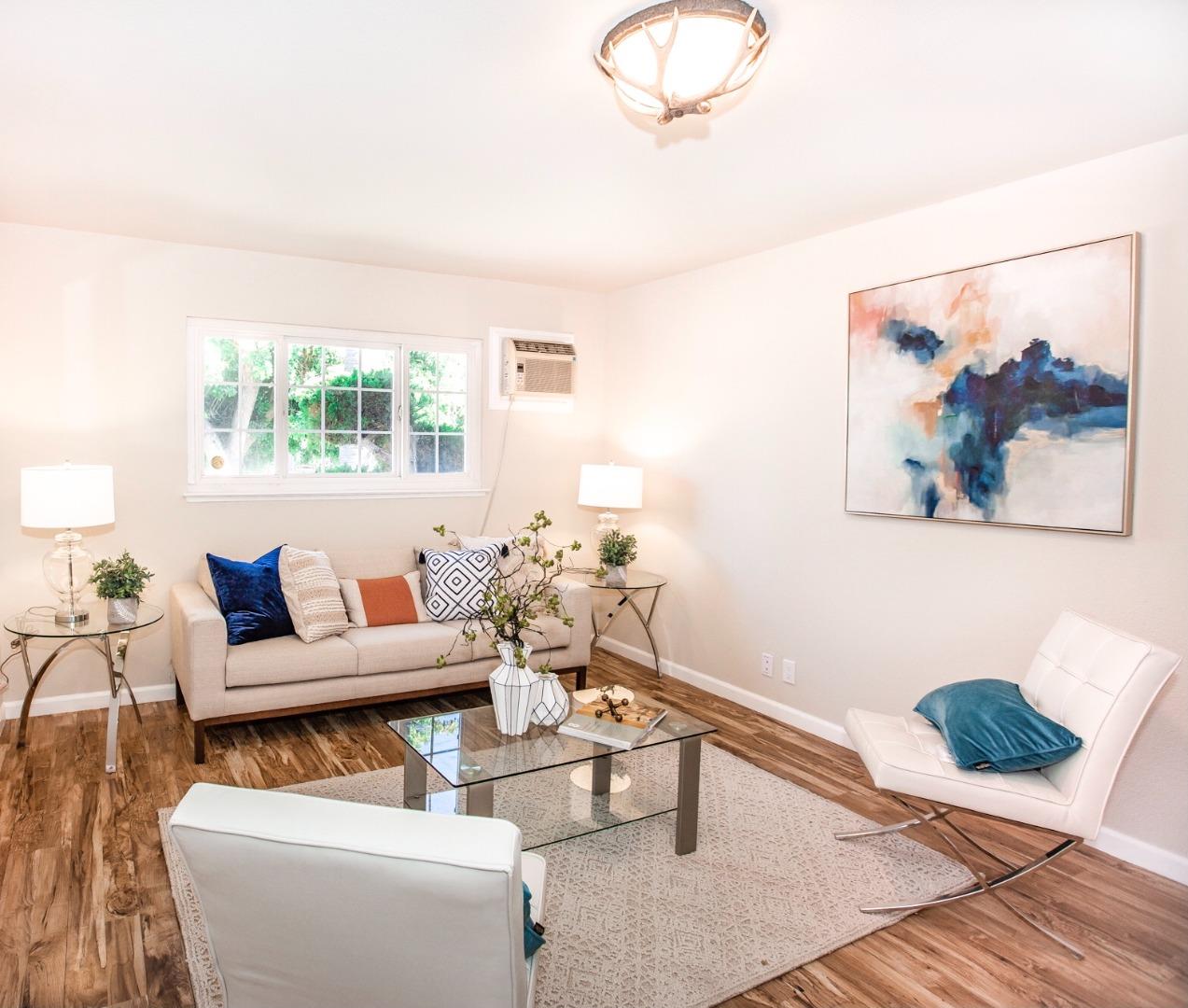 4447 Sloat Road Fremont, CA 94538 - Photo 11 of 28 a living room with furniture and a large window