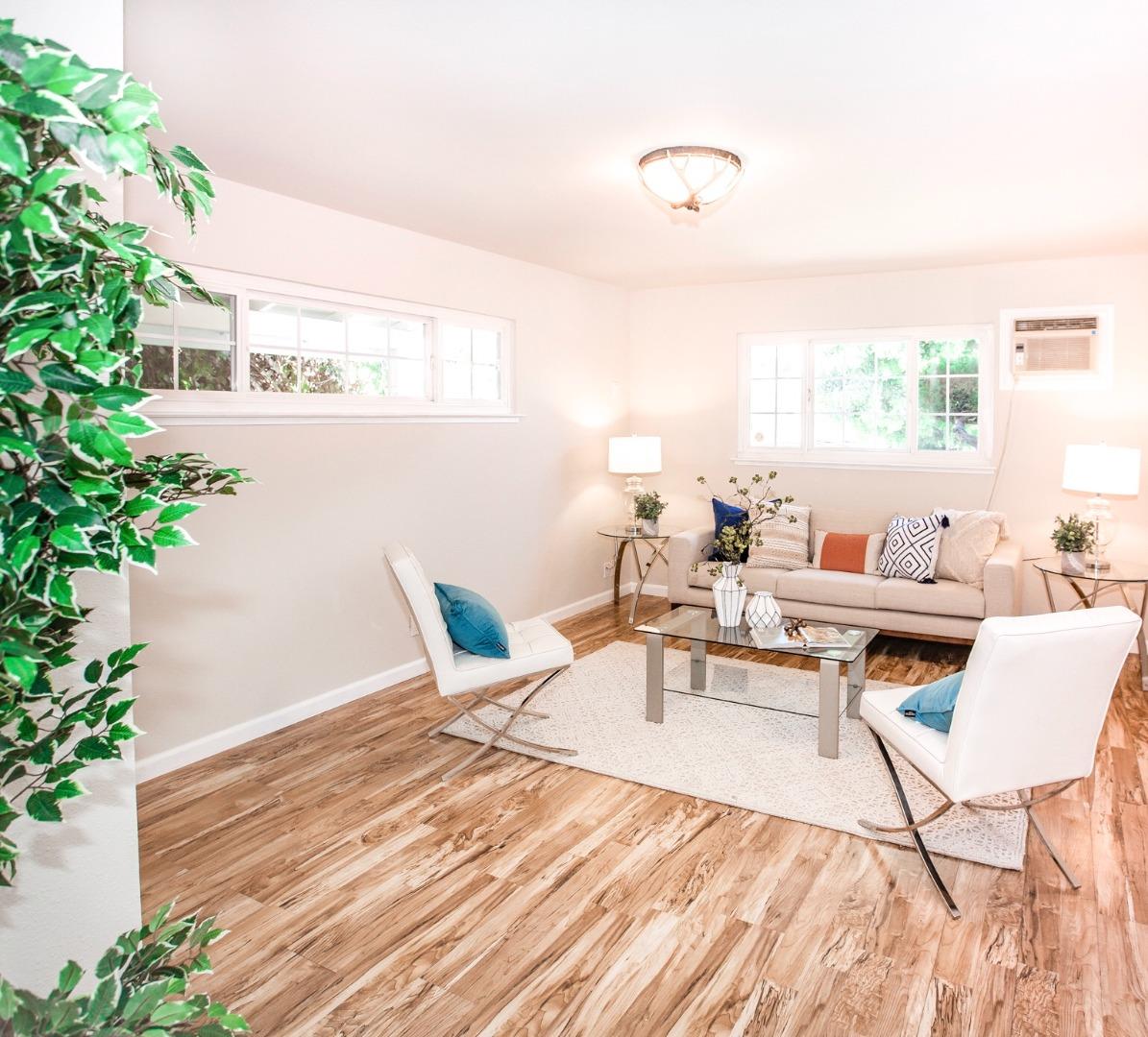 4447 Sloat Road Fremont, CA 94538 - Photo 12 of 28 a living room with patio furniture and a potted plant