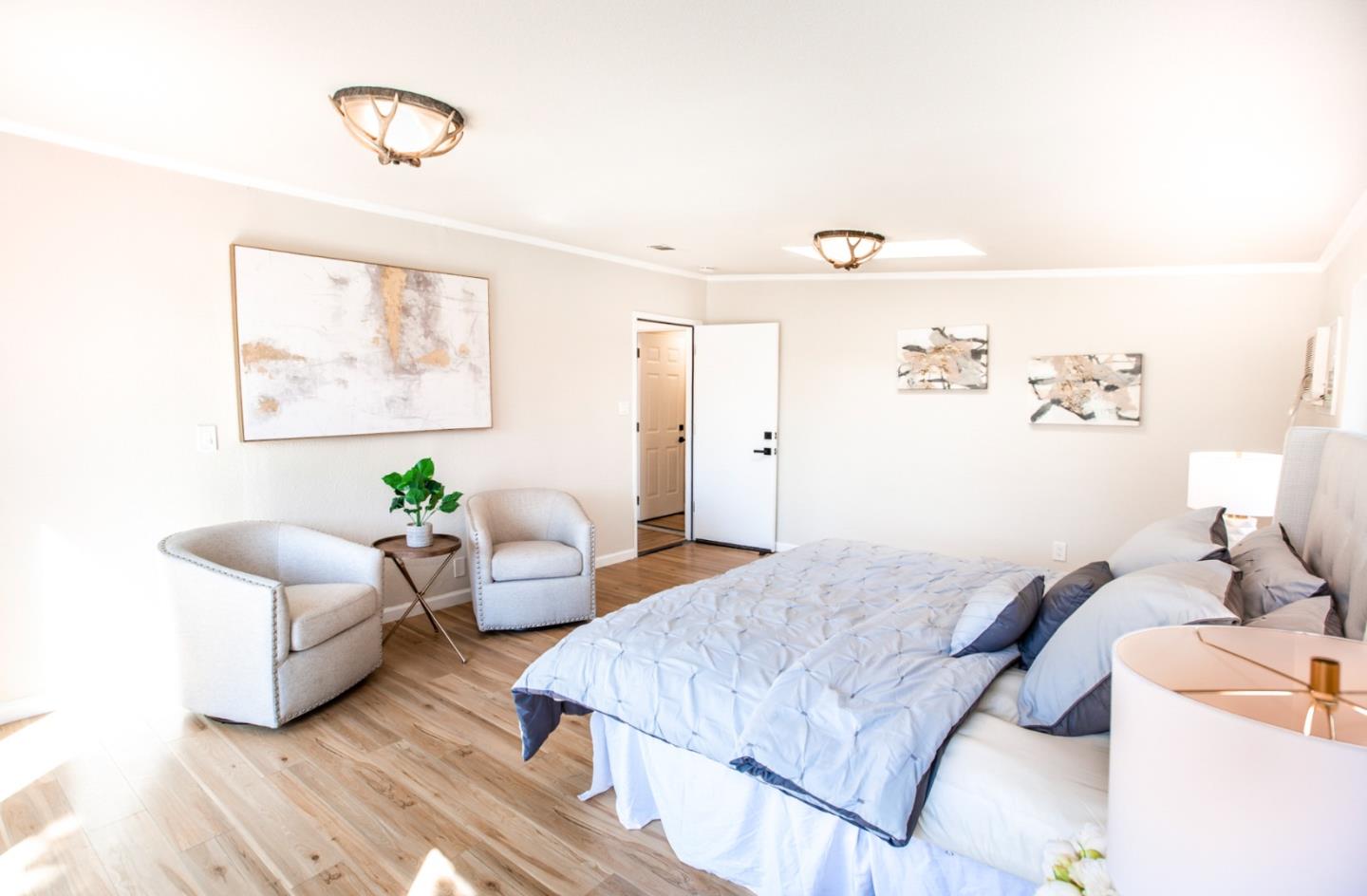 4447 Sloat Road Fremont, CA 94538 - Photo 17 of 28 a living room with furniture and wooden floor