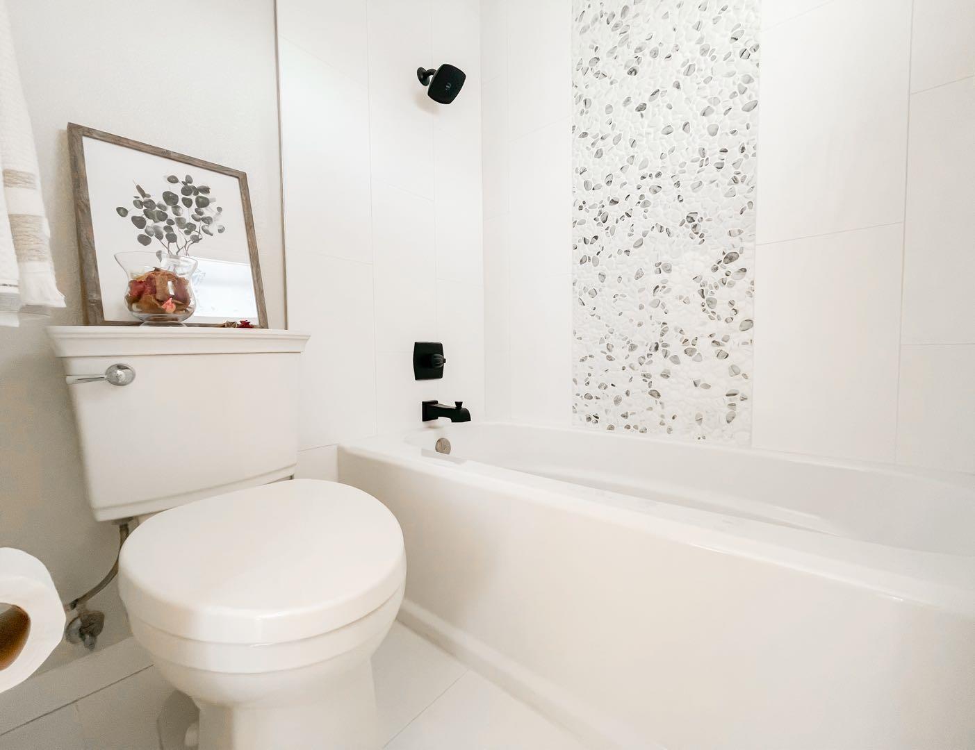 4447 Sloat Road Fremont, CA 94538 - Photo 21 of 28 a bathroom with a toilet and a shower