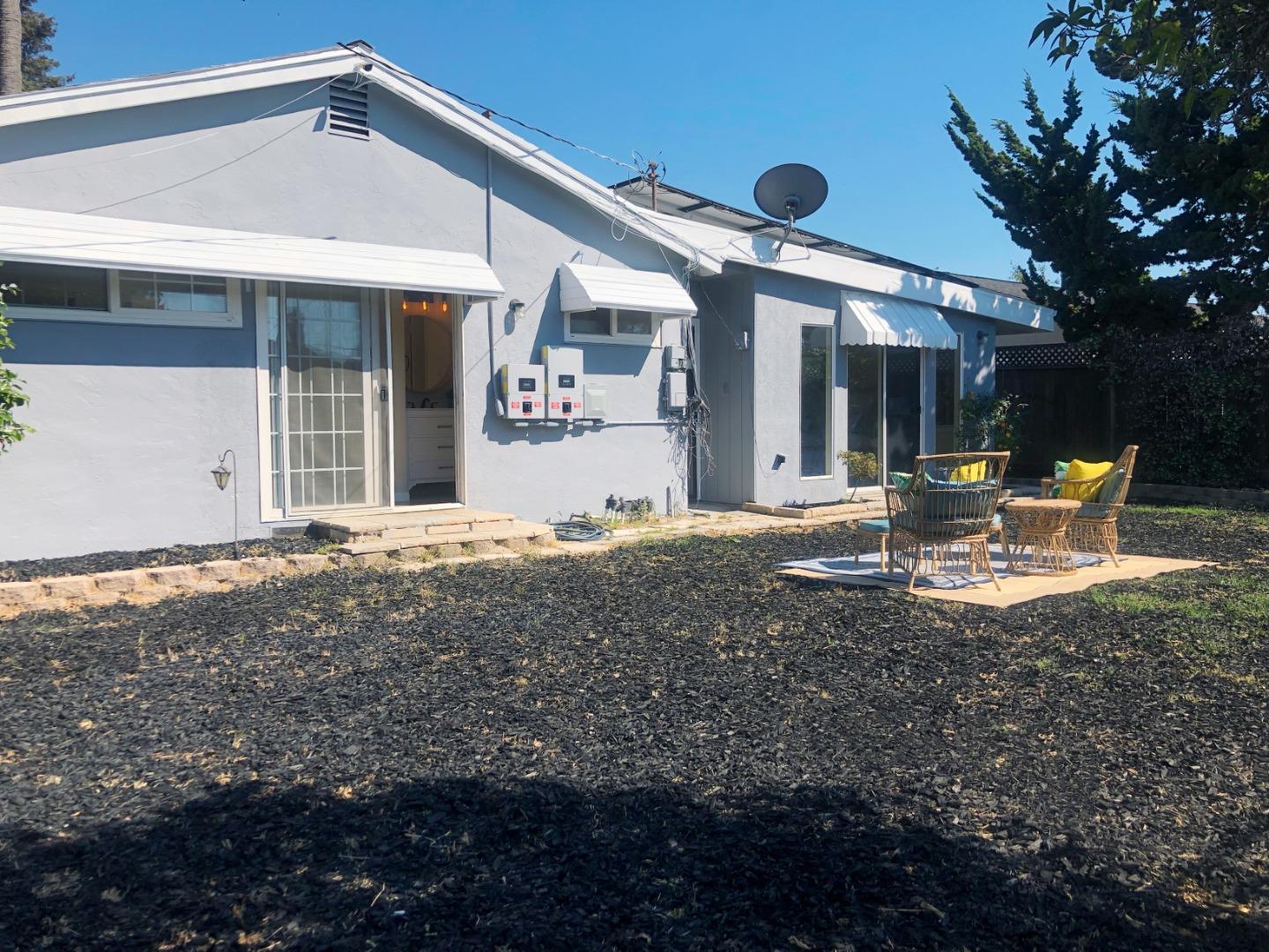 4447 Sloat Road Fremont, CA 94538 - Photo 26 of 28 a view of a house with backyard and sitting area