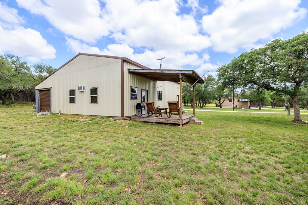 221 Coyote Trail Harper, TX 78631 - Photo 20 of 47 a view of a house with backyard