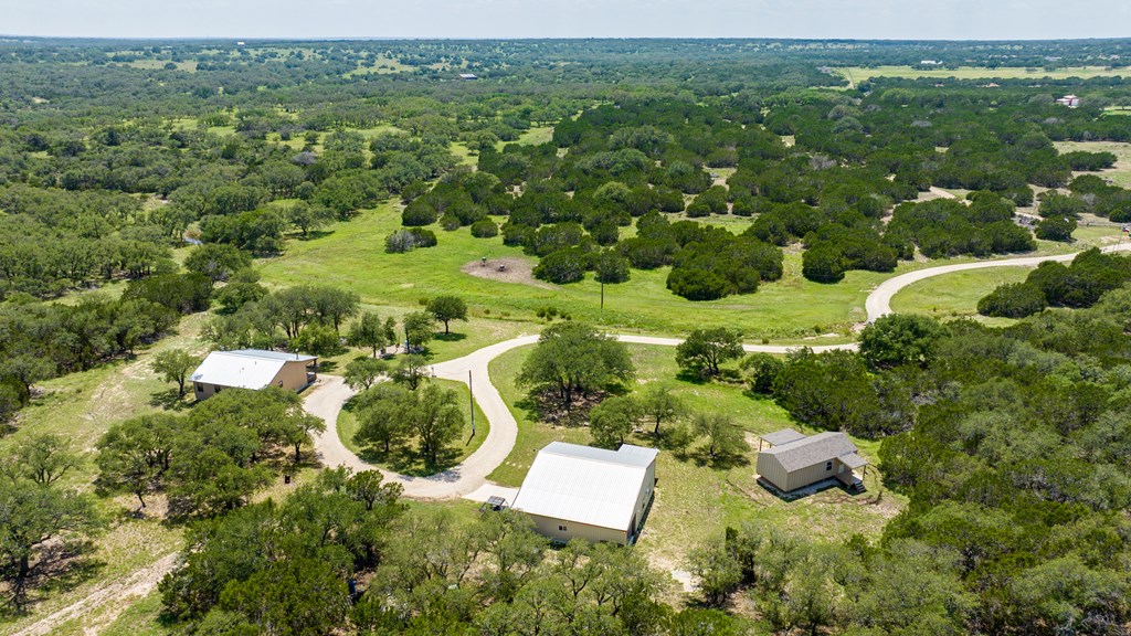 221 Coyote Trail Harper, TX 78631 - Photo 25 of 47 a view of a lush green field