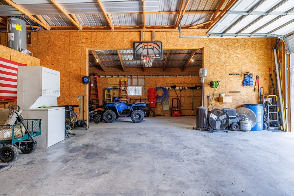 221 Coyote Trail Harper, TX 78631 - Photo 30 of 47 a view of a room with gym equipment
