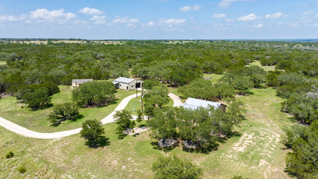 221 Coyote Trail Harper, TX 78631 - Photo 32 of 47 a view of a lake with a city