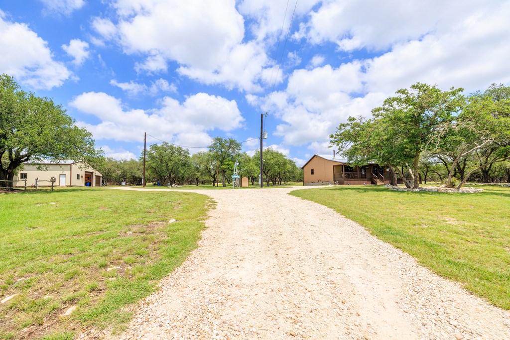 221 Coyote Trail Harper, TX 78631 - Photo 41 of 47 a view of building with garden space
