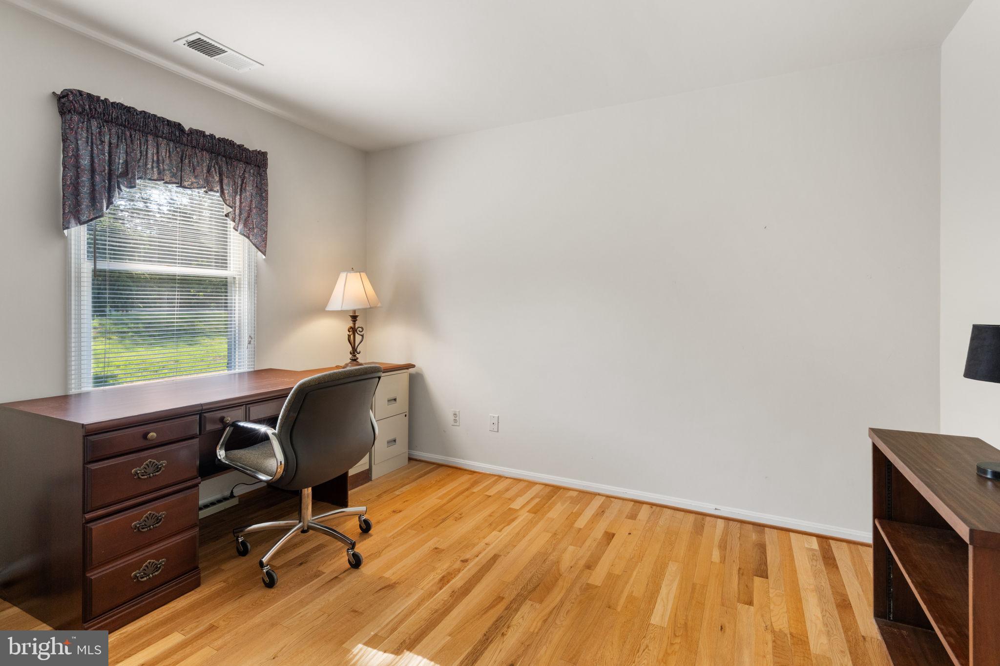 161 Troy Road Louisa, VA 23093 - Photo 29 of 60 a view of workspace with wooden floor windows