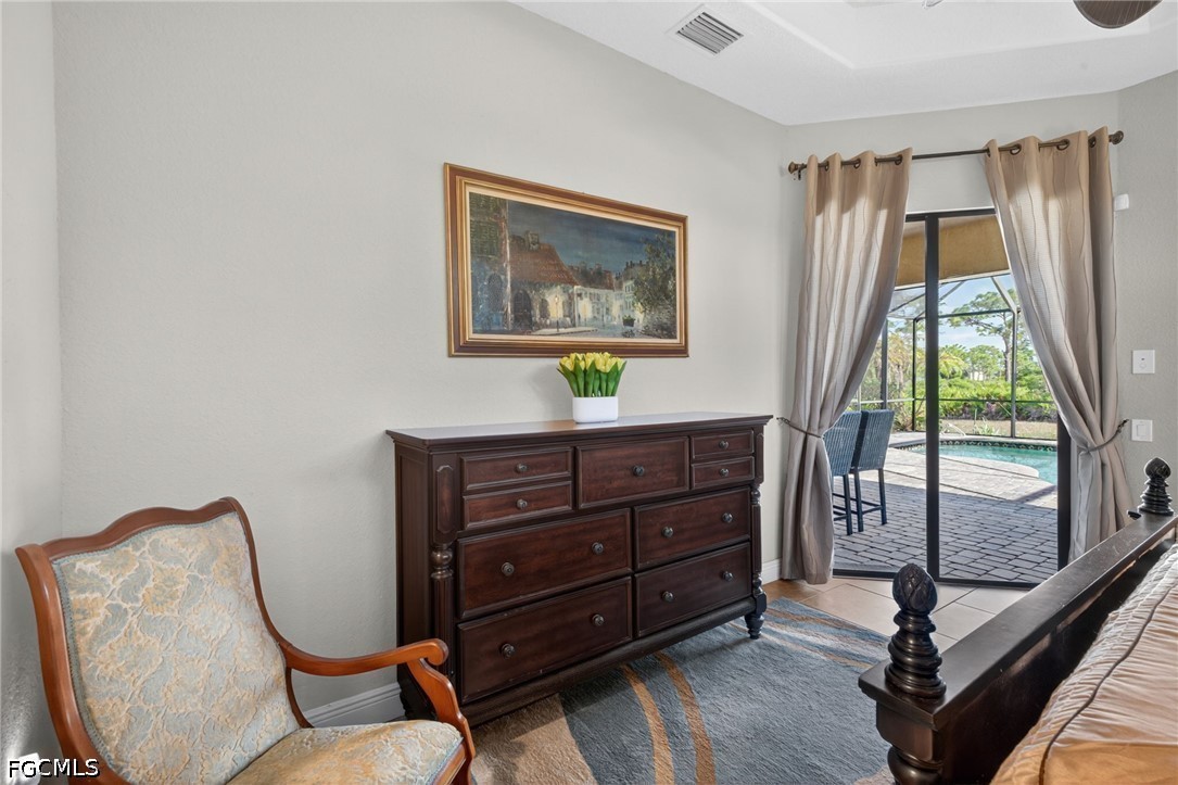 6109 Calusa Rdg Trail Bokeelia, FL 33922 - Photo 26 of 48 a room with furniture and a window