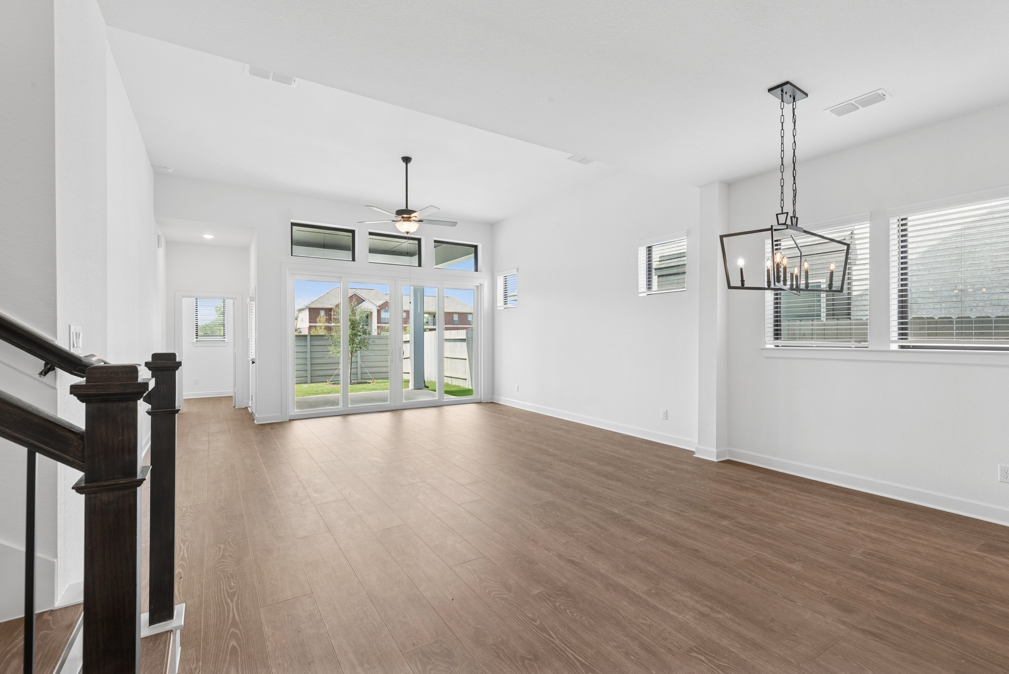 5510 Orangery Lane Manvel, TX 77578 - Photo 27 of 48 a view of empty room with wooden floor and fan