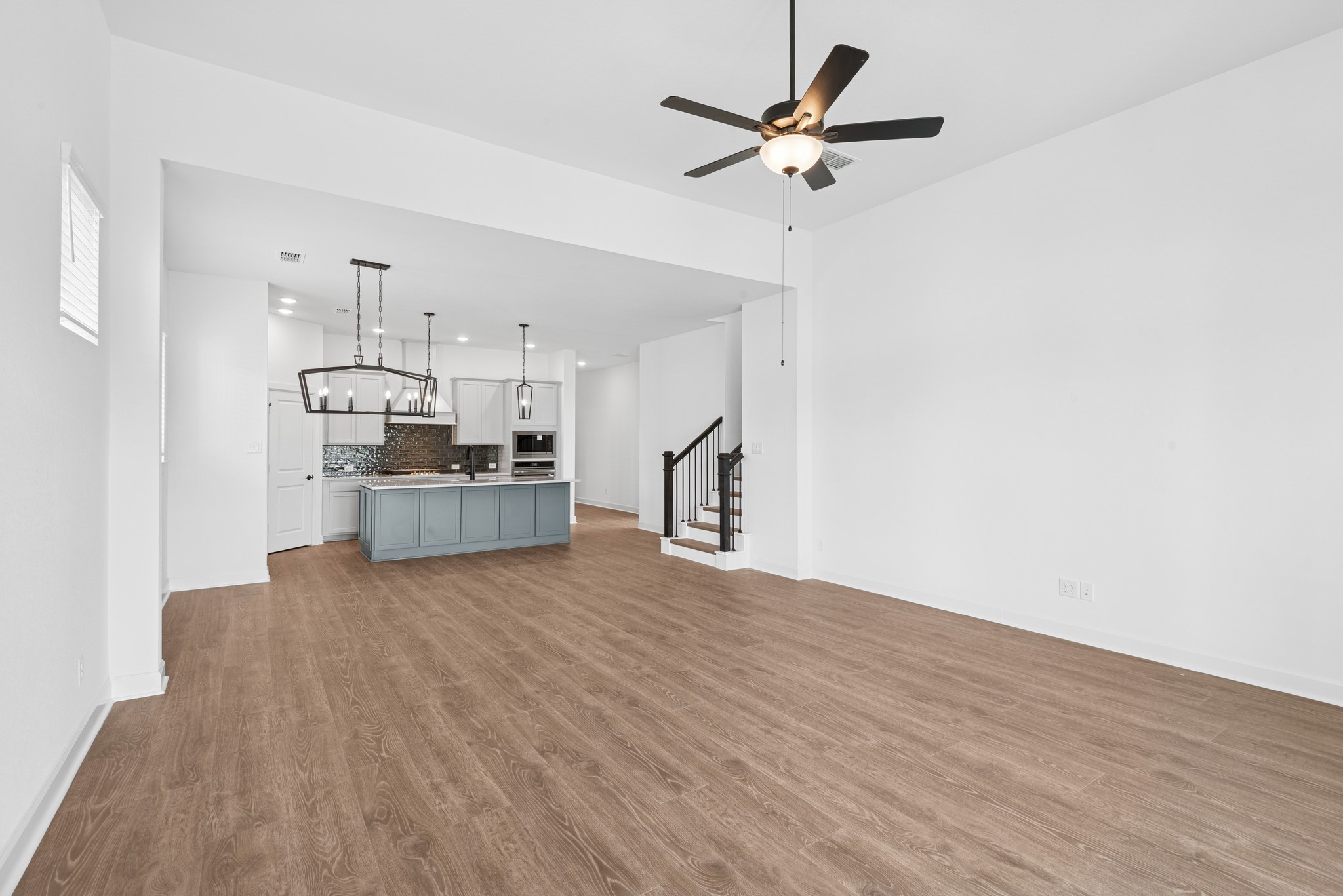 5510 Orangery Lane Manvel, TX 77578 - Photo 29 of 48 a view of a kitchen with wooden floor and a kitchen