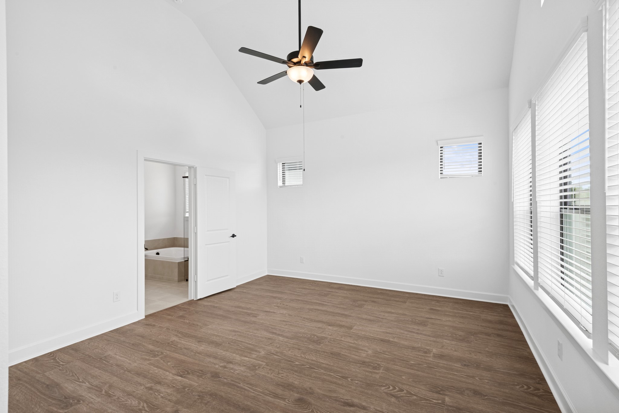 5510 Orangery Lane Manvel, TX 77578 - Photo 32 of 48 a view of a room with a ceiling fan and window