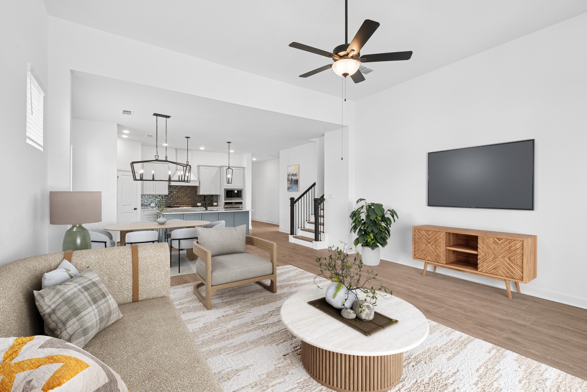 5510 Orangery Lane Manvel, TX 77578 - Photo 5 of 48 a living room with furniture a fireplace and a flat screen tv