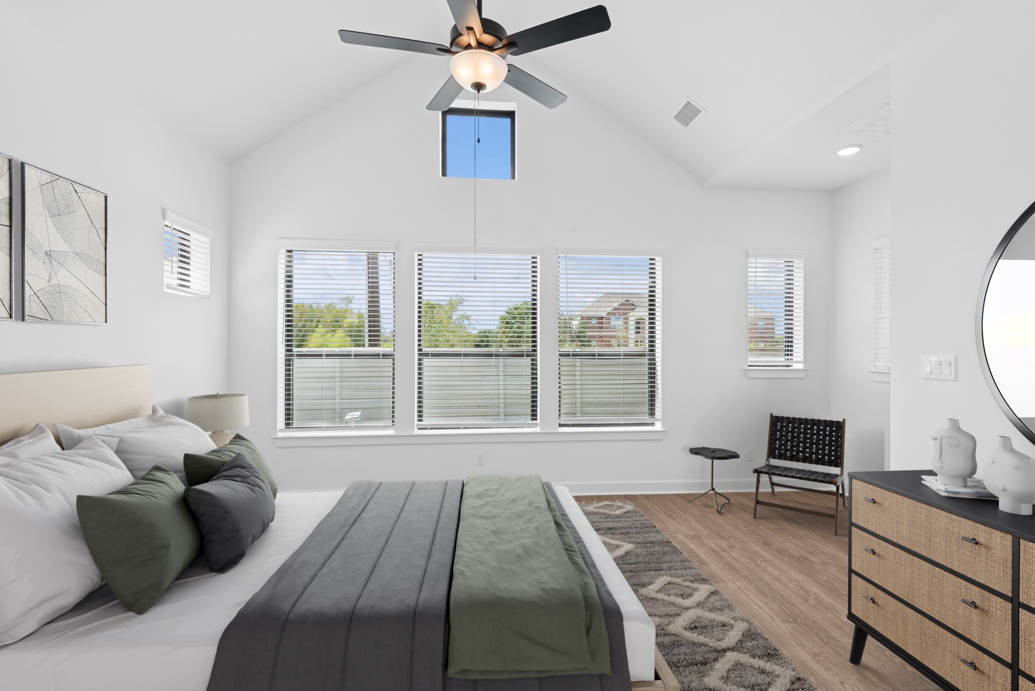 5510 Orangery Lane Manvel, TX 77578 - Photo 6 of 48 a bedroom with a bed a window and a chandelier