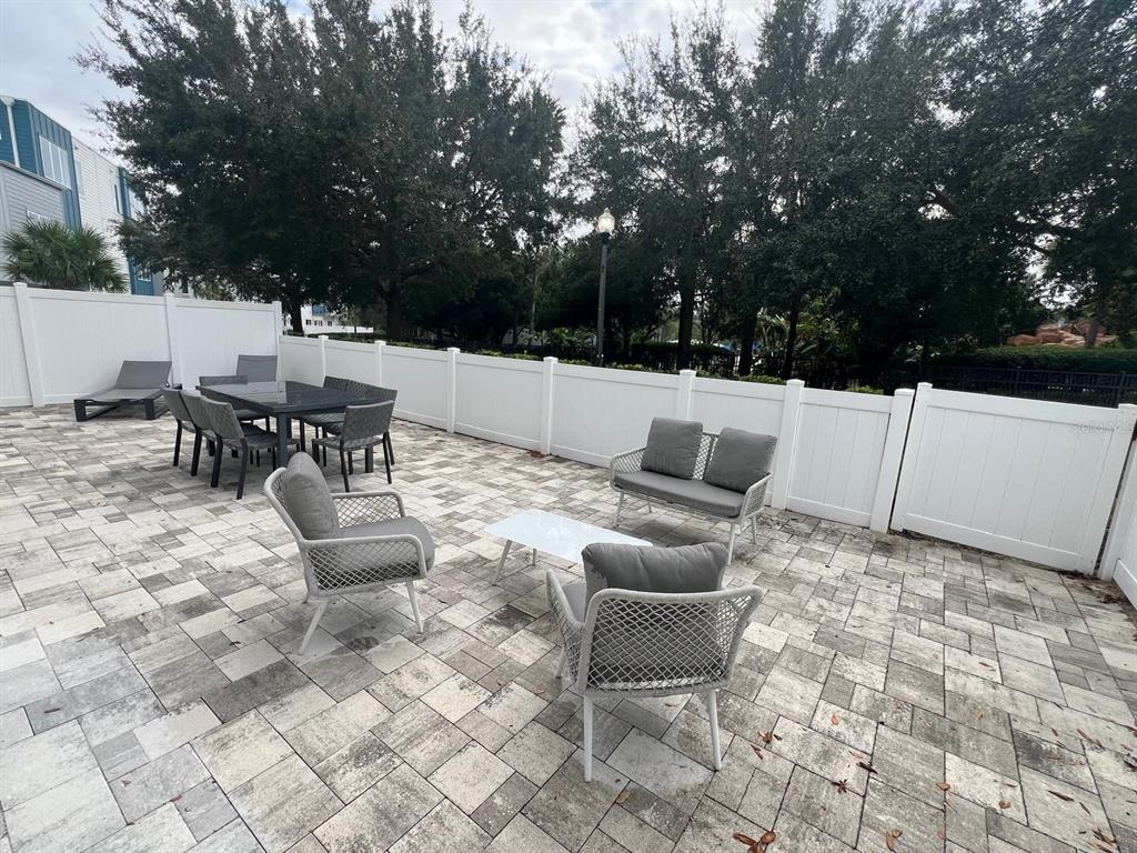 7770 Sandy Ridge Drive, Unit 126 Reunion, FL 34747 - Photo 11 of 33 a terrace view with sitting space