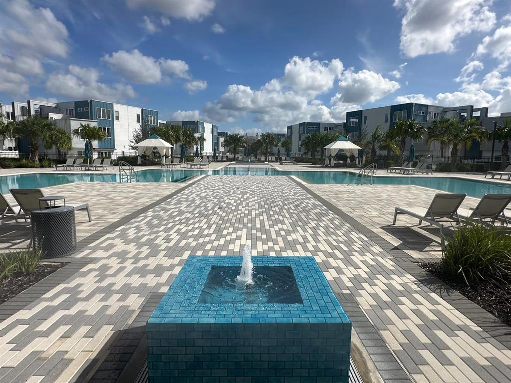 7770 Sandy Ridge Drive, Unit 126 Reunion, FL 34747 - Photo 14 of 33 a view of a patio with swimming pool