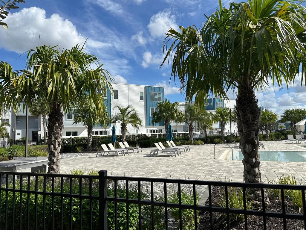 7770 Sandy Ridge Drive, Unit 126 Reunion, FL 34747 - Photo 15 of 33 a view of outdoor space with trees