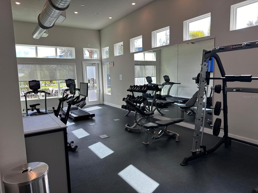 7770 Sandy Ridge Drive, Unit 126 Reunion, FL 34747 - Photo 18 of 33 a view of a room with gym equipment