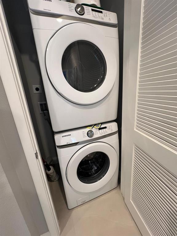 7770 Sandy Ridge Drive, Unit 126 Reunion, FL 34747 - Photo 28 of 33 a utility room with dryer and washer