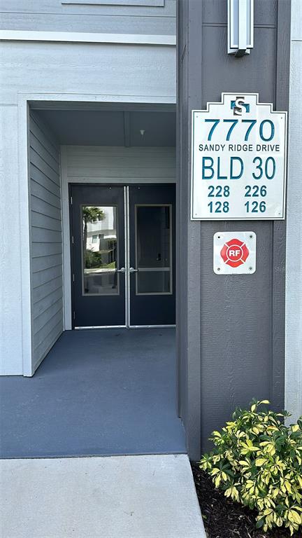7770 Sandy Ridge Drive, Unit 126 Reunion, FL 34747 - Photo 33 of 33 a view of an entryway door