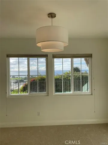 a view of a room that has a window in it