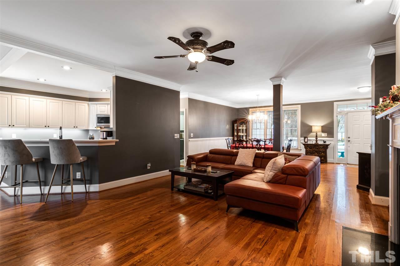 2408 Carruthers Court Raleigh, NC 27615 - Photo 13 of 30 a living room with furniture and a wooden floor