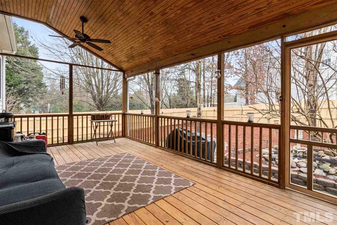 2408 Carruthers Court Raleigh, NC 27615 - Photo 23 of 30 a balcony with wooden floor in outdoor space