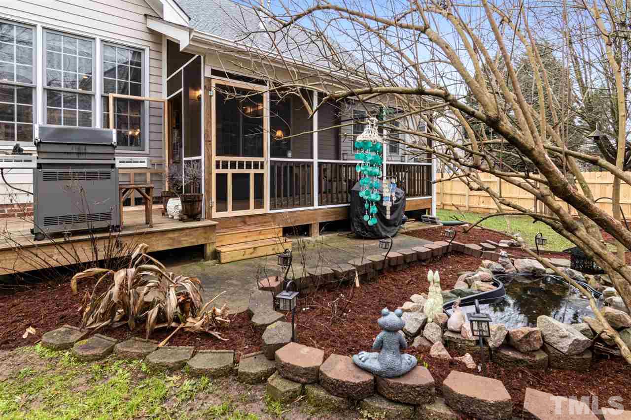 2408 Carruthers Court Raleigh, NC 27615 - Photo 25 of 30 a view of a house with yard and sitting area