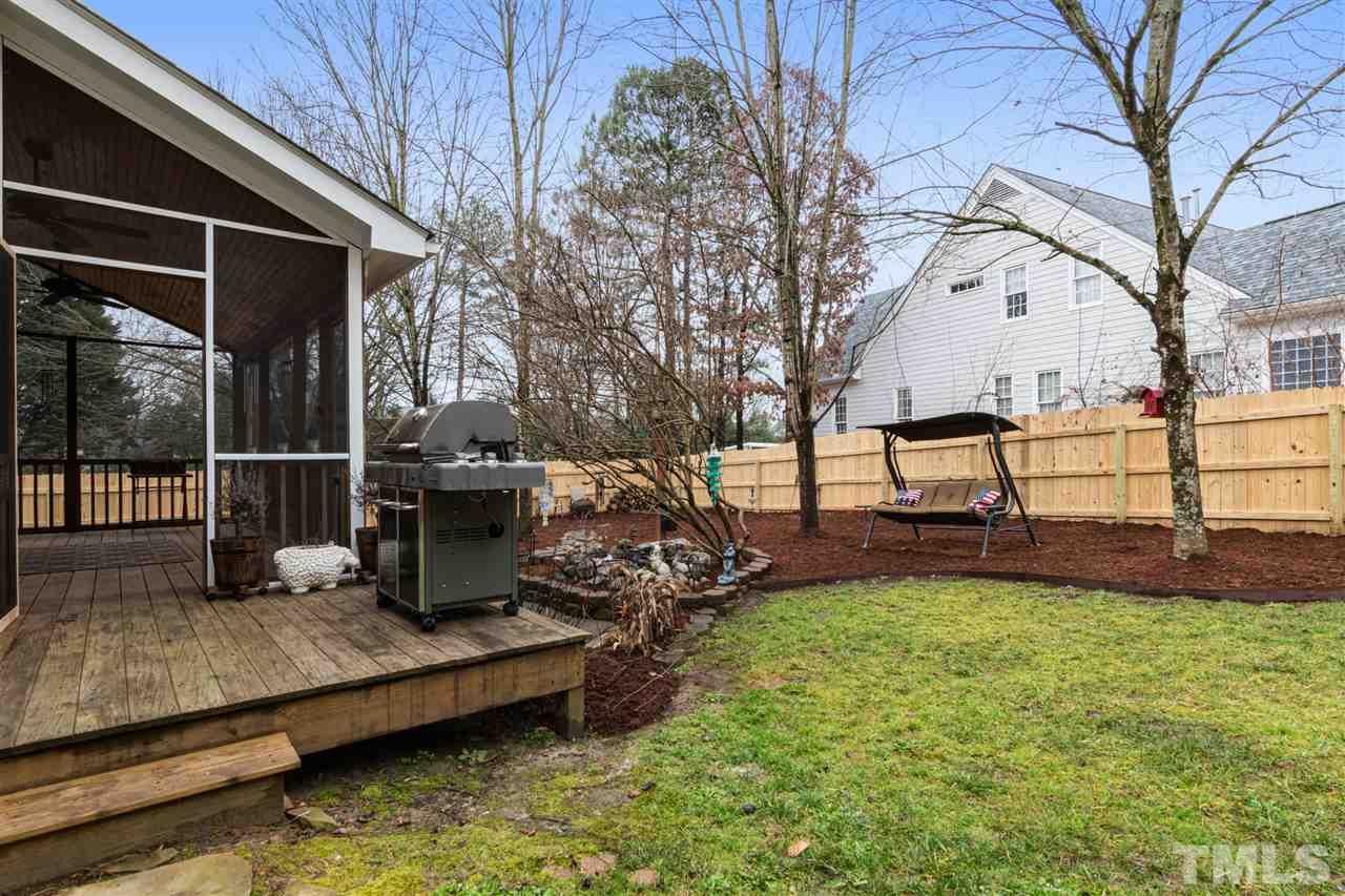 2408 Carruthers Court Raleigh, NC 27615 - Photo 26 of 30 a view of a backyard with sitting area